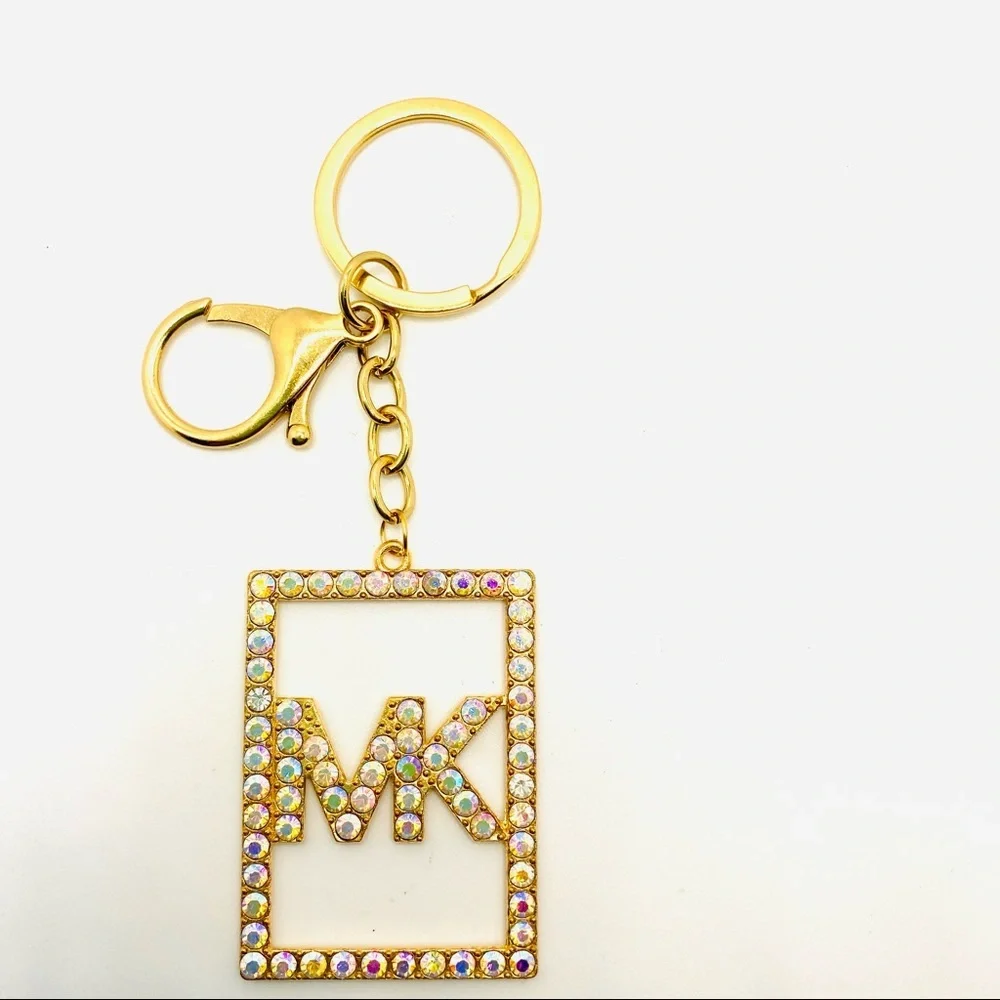 Purse Charm Key Chain MK in Iridescent Crystals set in golden tone. BRAND NEW